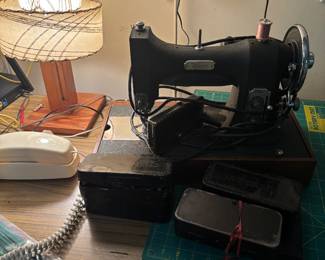 Sewing machine with attachements