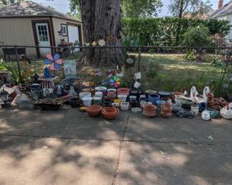Lots of planters and yard art