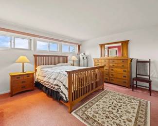 Queen sized bedroom set, rugs, chair and small bench..
