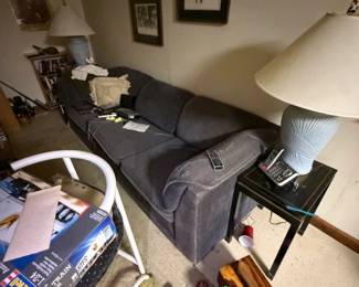couch, lamp, side tables, wall art