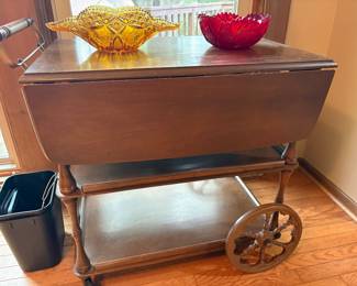 Vintage bar cart with wheels and side leaves