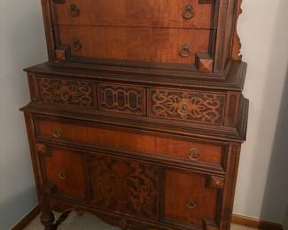1920s Renaissance Revival or Jacobean Revival walnut "chest-on-chest" highboy dresser