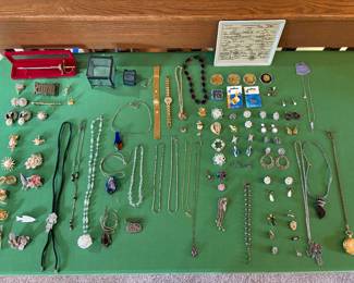Vintage bolo ties, letter openers, pins from the 2004 Olympics, proof sets and more!
