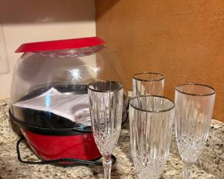 Popcorn machine and set of crystal champagne flutes