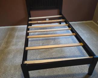 23 Dark wood twin bed frame