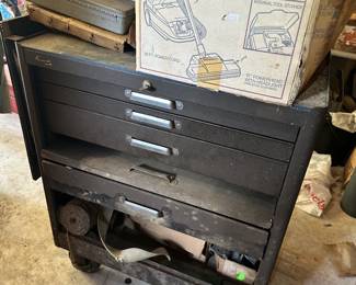 Black rolling tool chest and garage storage.