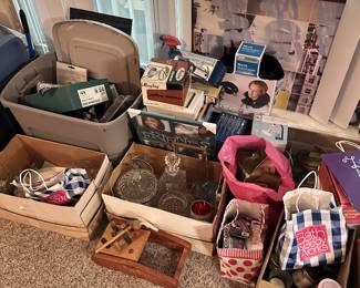 Baskets, candles, kitchenware, and household decor.