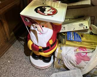 Florida State Seminoles Santa figure and sports collectibles.