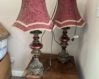 Matching decorative table lamps with fabric shades.