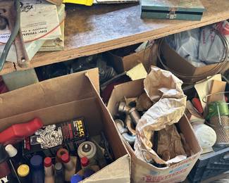 Boxed shop hardware, electrical supplies, and fittings.