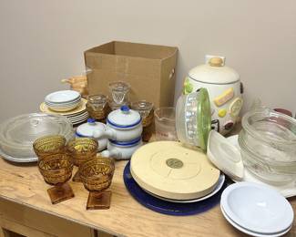 Glassware, dishes, serving pieces, and ceramic canisters.