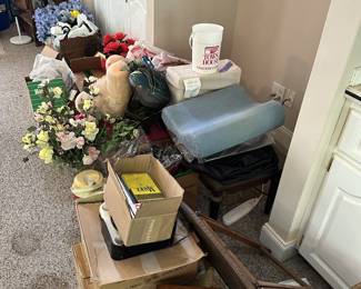 Artificial flowers, baskets, and household storage.
