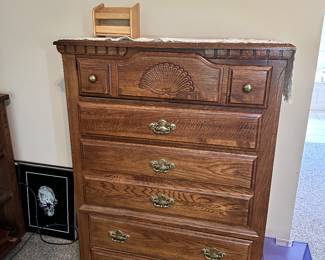 Carved wooden chest of drawers or dresser.