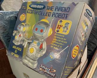 Boxed vintage radio-controlled robot toy.