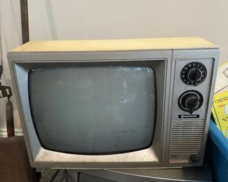 Vintage Samsung CRT television with manual tuning controls.