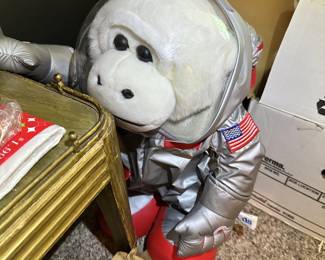 Novelty astronaut chimpanzee figure.