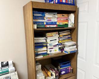 Books, magazines, paperbacks, and media storage shelf.