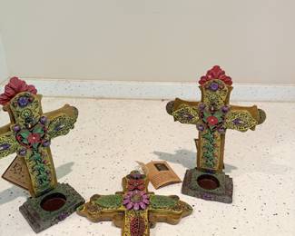 Jeweled decorative crosses and religious decor.