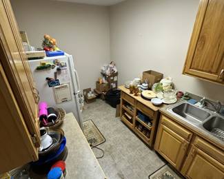 Kitchenware, dishes, small appliances, and household goods.