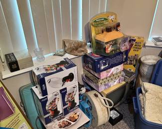 Boxed kitchen appliances and household goods.