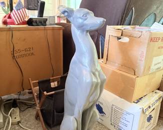 Large kangaroo figurine, boxes, and household decor.