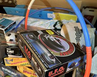 Boxed games, sporting goods, toys, and electronics.