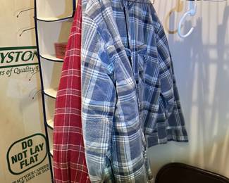 Men's plaid shirts and casual clothing.