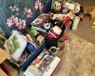 Assorted small appliances, personal-care items, and housewares.