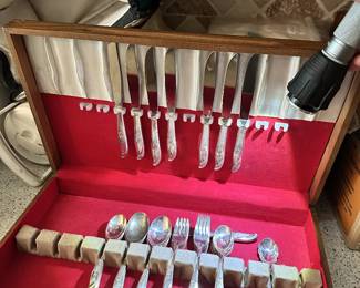 Stainless flatware and cutlery set in case.