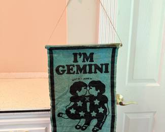 Gemini zodiac wall hanging.