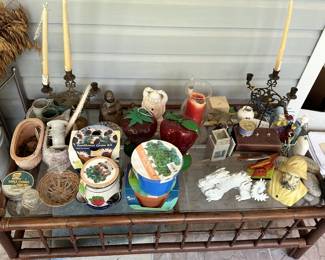 Mantel decor, candlesticks, figurines, and ceramics.