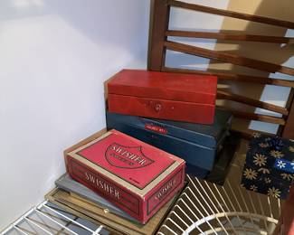 Wooden collectible boxes and small storage chests.