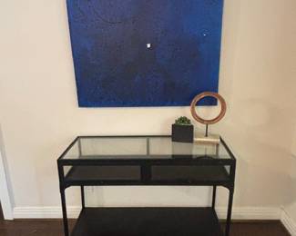 Black metal display shelving table.