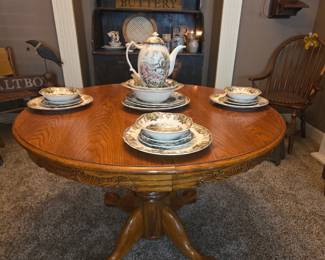 Several small solid wood kitchen tables
