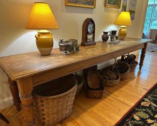 Long narrow antique harvest table. Measures 10'long  x 29" deep x 29" high
