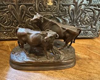"Bull and Cow" bronze sculpture by Jules Moigniez
