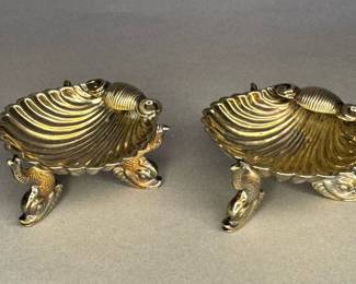 Pair of Silver Plated Salt Cellars featuring Scalloped Shell Bowls and Dolphin Feet