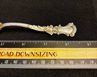S7 - $60. 26 gram sterling berry spoon. Monogrammed "Birdie".