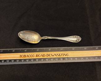 S8 - $25. 16 gram R. Wallace & Sons sterling spoon. Monogrammed "LU" or "LV" PAT.1898 Springborg.