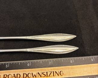 S20 - $75. 32 grams, sterling silver Rogers Bros olive forks.