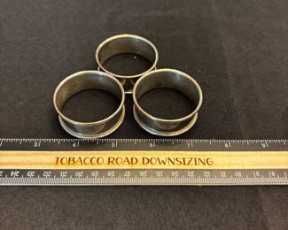S45 - $125. 54 grams. 3 pc Sterling Silver Napkin Ring Set.