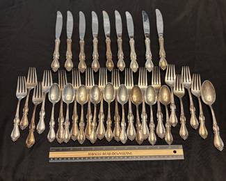 S1 - $2500. 35 pc Towle Sterling Silver Flatware Set. 8 dinner forks, 8 salad forks, 9 dessert spoons, 1 dinner spoon, 9 butter knives. Weight available upon request. 