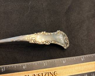 S36 - $75. 40 grams, Sterling silver ladle. Frank M Whiting. Monogrammed "EBY"