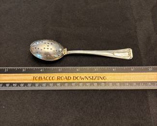 S10 - $75. 32 gram sterling silver tea infuser spoon.