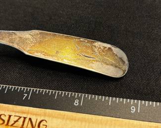 S15 - $50. 30 gram sterling silver spoon. Makers mark S.W