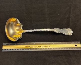 S34 - $195. 128 grams, Cowell & Hubbard sterling silver ladle. Monogrammed "EBW"