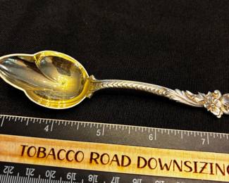 S7 - $60. 26 gram sterling berry spoon. Monogrammed "Birdie".