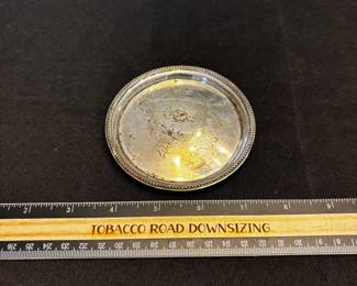 S41 - $95. 56 Grams, Sterling silver coaster.