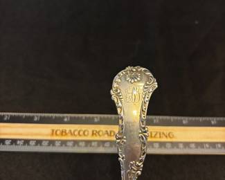S36 - $75. 40 grams, Sterling silver ladle. Frank M Whiting. Monogrammed "EBY"