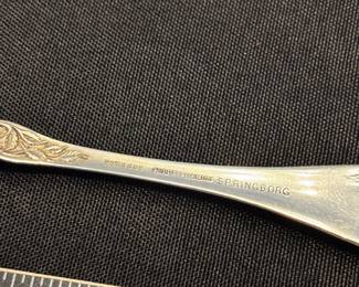 S8 - $25. 16 gram R. Wallace & Sons sterling spoon. Monogrammed "LU" or "LV" PAT.1898 Springborg.